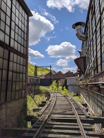 An Elevated Rail Leading into the Courtyard of an Abandoned Papermill