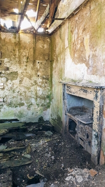 An old cooking range inside an abandoned croft in the Scottish Highlands