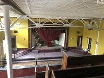 An old opera house turned into a church The new owner has one handyman attempting to renovate it