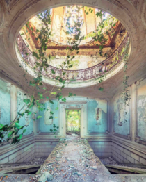 An ornately decorated room in an abandoned castle in French countryside