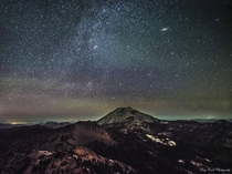 Andromeda Galaxy and part of the disc of the Milky Way rising over Lassen Peak in Northern California 
