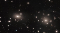 Apparent gravitational anomalies in the Coma Cluster are considered visual evidence of dark matter  Hubble