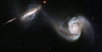 Arp  - a stunning pair of interacting galaxies NGC  and NGC A 