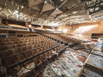 Auditorium in a large abandoned high school