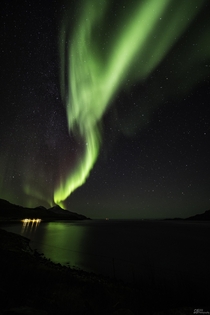 Aurora Borealis and the milky way hiding behind it Seen from Troms Norway 