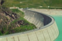 Awesome tilt-shift photograph of the Lac de Moiry Dam in the Swiss Alps 