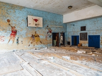 Basketball players on the wall of an abandoned Elementary School OC