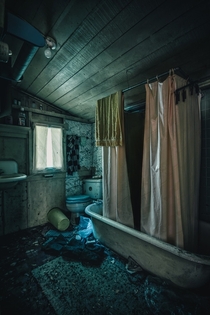 Bathroom in an abandoned cabin CA 