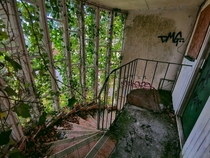 Beautiful Abandoned Staircase in Old Hotel 