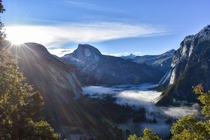 Beautiful sunrise over a foggy Yosemite Valley California 