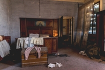 Bedroom inside an abandoned villa in Italy
