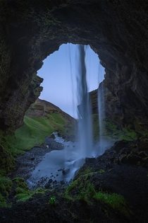 Behind a waterfall in Iceland during dusk at  am  IG holysht
