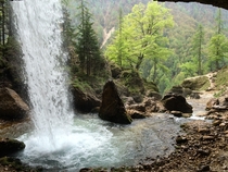 Behind the waterfall Julian Alps Slovenia 