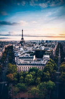 birds-eye view photography of Eiffel Tower under cloudy sky Paris France 