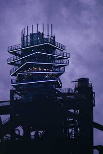 Bolt Tower in Ostrava Glass structure is built on top of blast furnace at the former mining complex 
