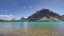 Bow Lake in Alberta where the waters are somehow both crystal clear and neon blue 