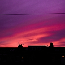 bright pink toned sunset over Musselburgh Scotland