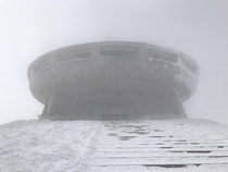 Buzludzha Bulgaria very foggy and windy and cold Iphone closed in  minutes so I dont have better photos