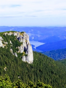 Ceahlau mountain and lake Bicaz in Romania 