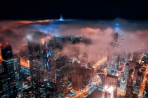 Chicago skyline with fog at night Photo credit to Cameron Venti