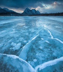 Chilling Alberta frozen lake and beautiful mountains 
 