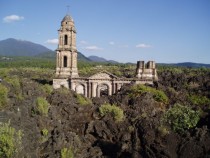 Church spires projecting from the lava which buried San Juan Parangaricutiro Mexico 
