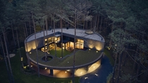 Circlewood House in Warsaw Poland - made out of wood in the shape of a perfect circle 