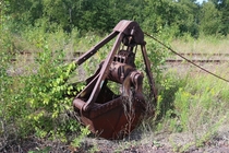 Clamshell bucket along an abandoned rail line in northern Minnesota 