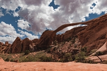 Cloud break over landscape arch Moab Utah 