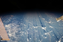 Clouds casting thousand-mile shadows when viewed from the ISS 