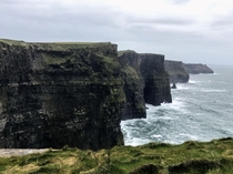 Cloudy rainy day at Cliffs of Moher in Ireland March  