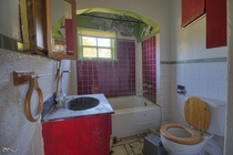 Colourful Bathroom Inside an Abandoned Farm House in Rural Ontario 