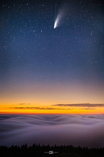 Comet Neowise hangs above a serene blanket of San Francisco Bay Area fog as seen from the peak of Mt Tamalpais -  - IG BersonPhotos