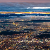 Continuing layers of mountain and cityscape in Seoul South Korea 