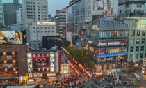 Crowded streets of Myeong-dong Ward a major shopping district in downtown Seoul South Korea 