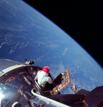 David Scott looks out on the earth from his Apollo  command module 