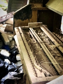 Decaying piano in an abandoned church 