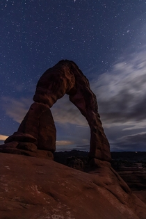 Delicate Arch lit only by the moon Arches National Park Moab UT