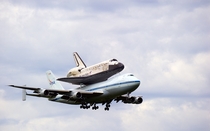 Discovery being carried from Kennedy Space Center Florida to Washington DC by a Shuttle Carrier Aircraft By its last mission Discovery had flown  million miles  million km in  missions completed  orbits and spent  days in orbit in over  years 