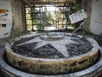 Dried fountain inside an abandoned resort in Mexico  Album in comments