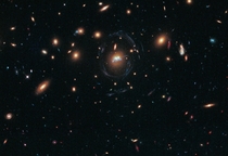 Droplets of star formation and two merging galaxies in SDSS J 