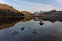 Early Morning Reflections at Blea Tarn Lake District UK 