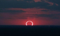 Eclipse and sunrise at the same time