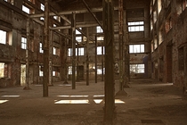 Empty factory building - no floors no windows just beams and walls - somewhere in Leipzig Germany 