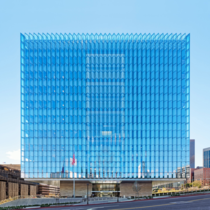 Envisioned as a floating cube Skidmore Owings amp Merrills new United States courthouse in downtown Los Angeles The building is designed as a glass clad cube that hovers over a stone base