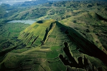 Erosion on the slopes of a volcano near Ankisabe Madagascar  by Yann Arthus-Bertrand