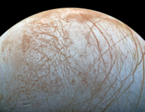 Europa the smallest of Jupiters Galilean moons It is primarily made of silicate rock and has a water-ice crust and an ironnickel core as well as a very thin atmosphere composed mostly of oxygen  image NASAJPL