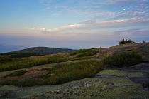 Evening light and waxing moon on Cadillac Mountain in Maines Acadia National Park Maine 