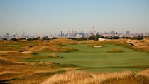 Ferry Point golf course with background of Manhattan skyline