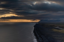 Fiery Sunset on Black Sand Beach in Iceland 
